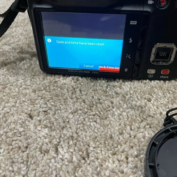Black Kodak camera with accessories